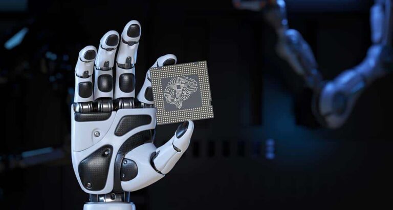 Robotic hand holding AI microchip with digital brain circuitry