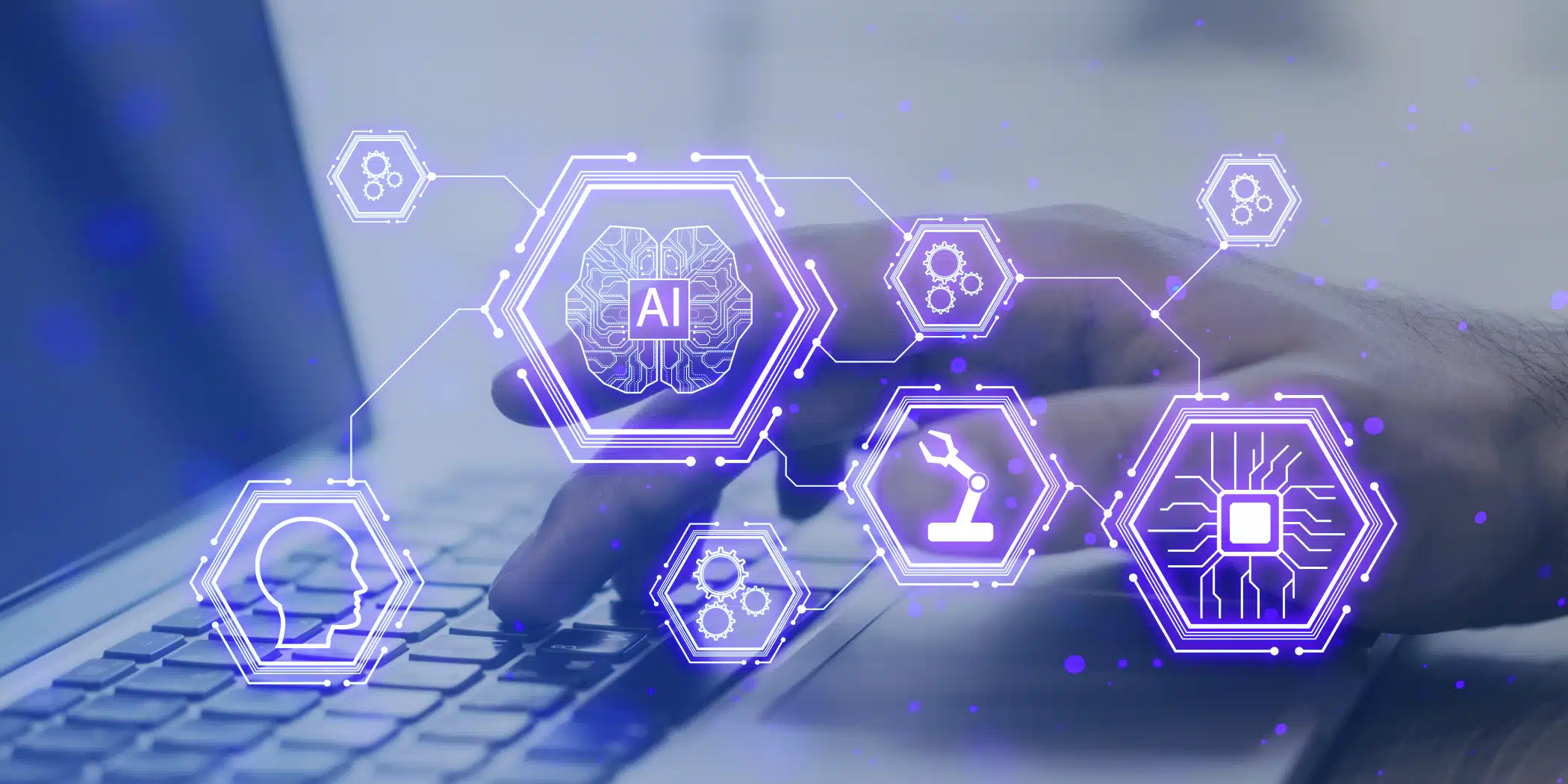 Hands typing on laptop with glowing AI technology icons
